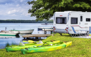 Camper By Lake