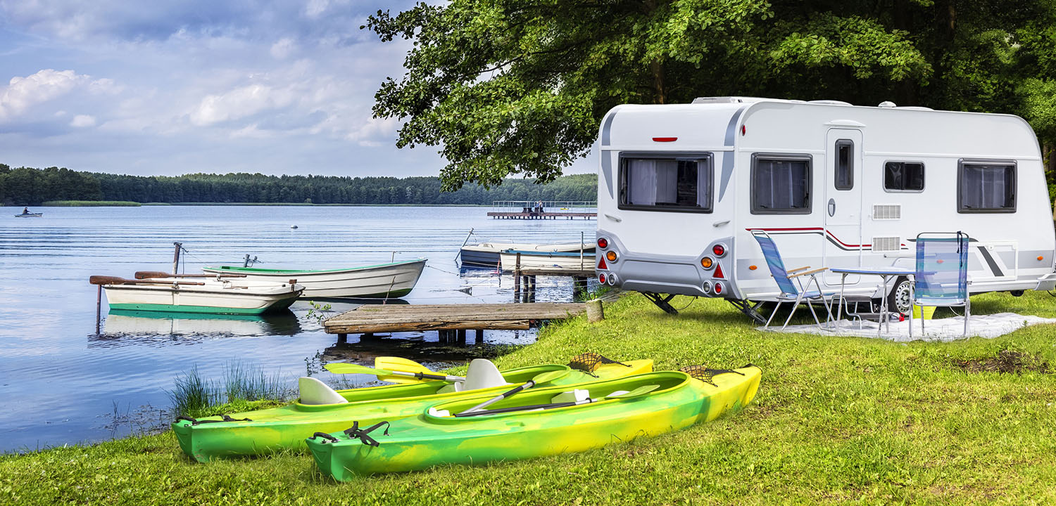 Camper By Lake